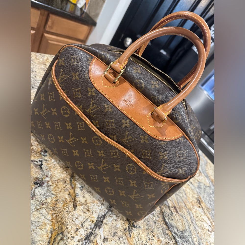 **SOLD**
Louis Vuitton Brown and Tan Travel Bag